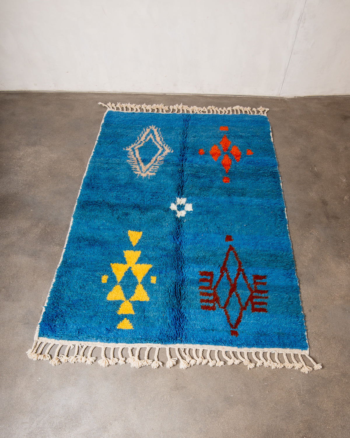 Modern, designer, handcrafted Berber rug from Morocco. Beniourain carpet with beautiful colours and patterns and fluffy wool texture.